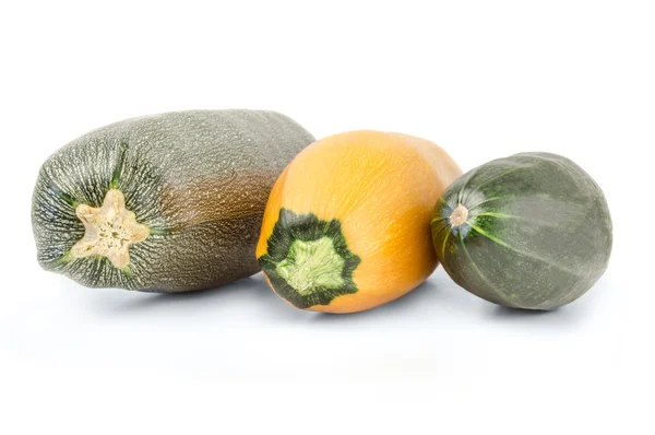 Цуккини овощи, желтого и зеленого цвета на белом фоне Стоковое Фото