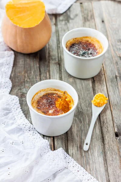 Pumpkin casserole with millet. millet porridge with pumpkin. brule pumpkin cream Стоковое Изображение