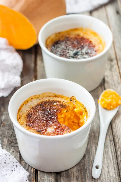 Pumpkin casserole with millet. millet porridge with pumpkin. brule pumpkin cream Стоковое Фото