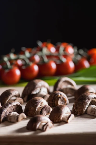 Close Shot Halved Champignon Mushrooms Wooden Cutting Board Black — стоковое фото